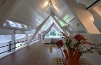 Kamer met Queensize Bed en Uitzicht op de Tuin