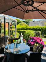 Nordsee Ferienhaus nahe Bensersiel Kamin Garten - Chambres d'hôtes Holtgast