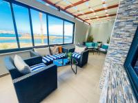 Appartement 2 Chambres avec Terrasse et Vue sur la Mer RDC 4