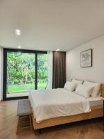 Kamer met Kingsize Bed en Uitzicht op de Tuin