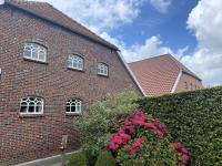 Reihenhaus in Strackholt mit beheiztem Pool - Chambres d'hôtes Strackholt