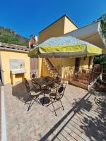 Casa Vacanze Geppy e Minù Gole Alcantara - B&B Motta Camastra