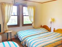 Dreibettzimmer mit Gemeinschaftsbad
