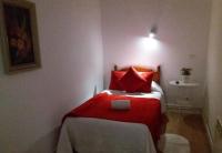 Camera Singola con Bagno in Comune