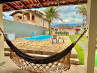 Casa com piscina 500m da praia condomínio Morada da Praia - B&B Bertioga