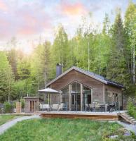 Newly built cabin with sauna, fireplace and amazing view - B&B Järvsö