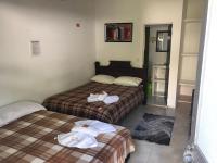 Chambre Triple avec Salle de Bains Privative