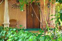 Chambre Double ou Lits Jumeaux Deluxe – Vue sur Jardin