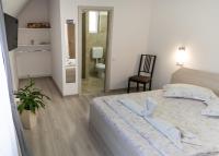 Kamer met Queensize Bed en Balkon