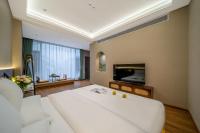 Chambre Lit King-Size - Vue sur Jardin