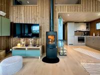 Modern cabin Skeikampen with ski-in out cross country trails & great view - Chambres d'hôtes Aulstad