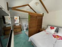 Bungalow "Doussin' Kreyol", au calme à 150m de la plage - B&B Grande Anse