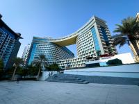 Beachfront 1 Bedroom Apartment on Palm Jumeirah with Stunning Sea Views and Rooftop Infinity Pool - Chambres d'hôtes Dubaï