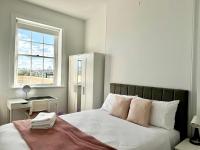 Zimmer mit Queensize-Bett und Meerblick