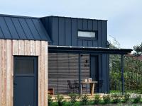 Lykke Huus Tinyhaus an der Nordsee mit Fasssauna - Ferienwohnung Schweiburg