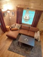 Kotoisa hirsihuvila Ylläksellä - B&B