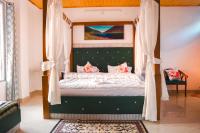 Kamer met Kingsize Bed en Uitzicht op de Bergen