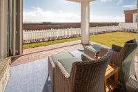 Deichsonne - mit Wintergarten und Blick Richtung Wattenmeer - Ferienwohnung