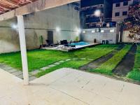 Casa de Praia com Piscina e Churrasqueira a 280m da Praia do Morro - 3 quartos com Ar Condicionado, sendo 2 suítes- Quintal amplo, ideal para famílias - B&B Guarapari