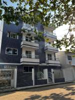 Apartamento completo a 2 min à pé da praia - Chambres d’hôtes