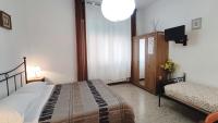 Dreibettzimmer mit eigenem externen Bad