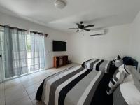 Suites Amplias en Quinta Avenida - B&B Playa del Carmen