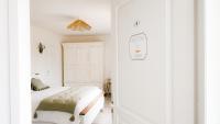 Kamer met Queensize Bed en Uitzicht op de Tuin