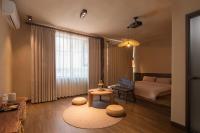 Chambre Lit Queen-Size Deluxe