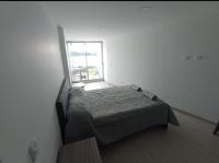 Three-Bedroom Apartment with Balcony