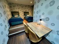 Doppel-/Zweibettzimmer mit Gemeinschaftsbad