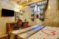 Kamer met Kingsize Bed en Uitzicht op het Zwembad