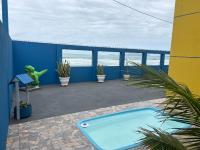 Pé na areia apto Rassy - Chambres d’hôtes