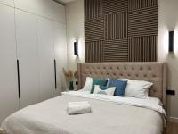 Metropole Apartment - Ferienwohnung Almaty