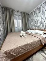 уютная квартира - Bed and Breakfast