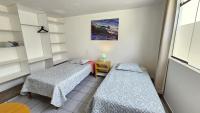 Single Bed in Dormitory Room
