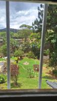 Camera Tripla con Vista Giardino