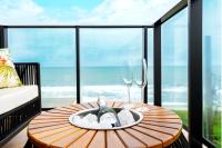 Conforto e Estilo Vista para o Mar Hidromassagem Wi-Fi Ar Condicionado Vaga Privativa e a Passos da Praia - Ferienwohnung