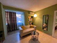 One-Bedroom Apartment with Balcony and City View