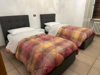 Tweepersoonskamer met 2 Aparte Bedden