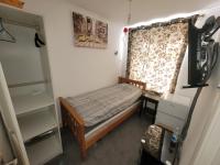 Eenpersoonskamer met Gedeelde Badkamer en Toilet