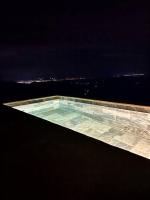 Cabaña con piscina y vista al mar - Chambres d’hôtes