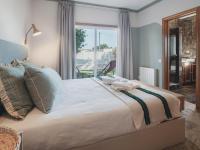 Kamer met Queensize Bed en Uitzicht op de Tuin