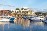 MüritzKieker - Apartment in der Hafenresidenz mit Kamin & Wellness - B&B
