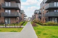 Jasny Apartament Blisko Lotniska Ławica w Poznaniu by Noclegi Renters - B&B