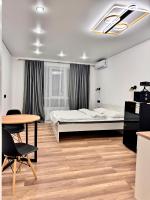 1 комнатная студия с Кинотеатром 1В - B&B Almaty