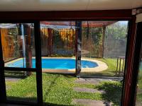 Hermosa casa con piscina climatizada cubierta en Bella Vista, Piriápolis - B&B