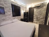 Quadruple Room with Private Bathroom