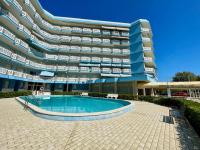 Sea view apartment with shared pool - B&B Porto Santa Margherita