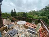 Camera Familiare con Vista Giardino