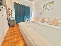 Kamer met Queensize Bed en Uitzicht op de Tuin